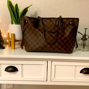 Gently used Louis Vuitton PM Neverfull.